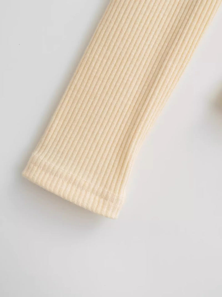 アシンメトリーネックリブトップス