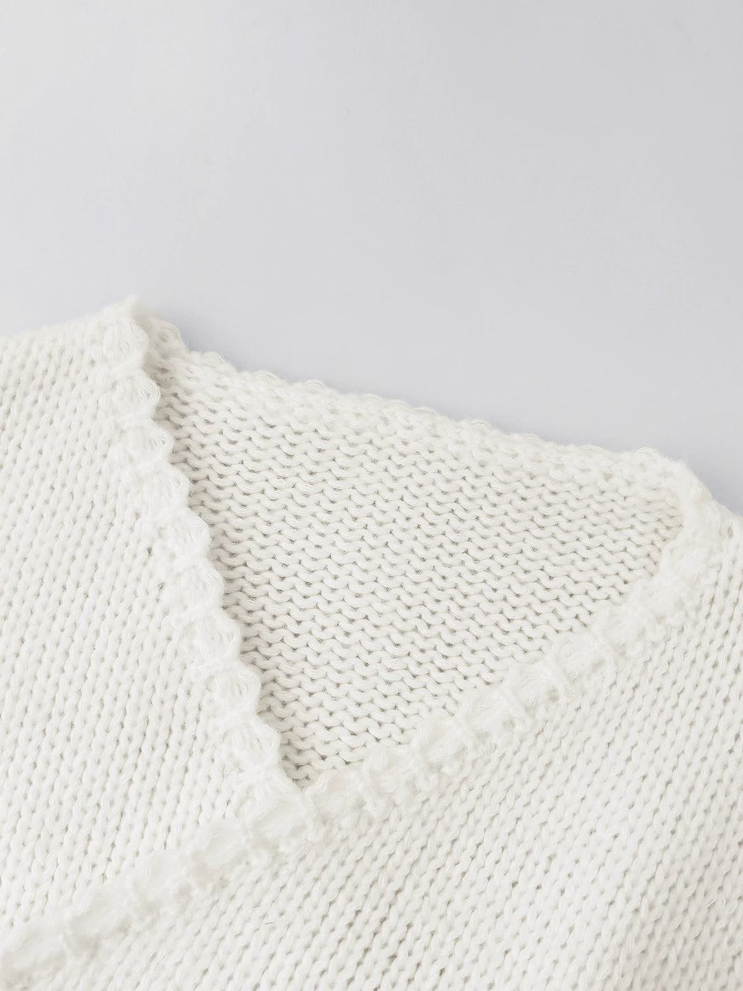 バックドローリボンVネックセーター