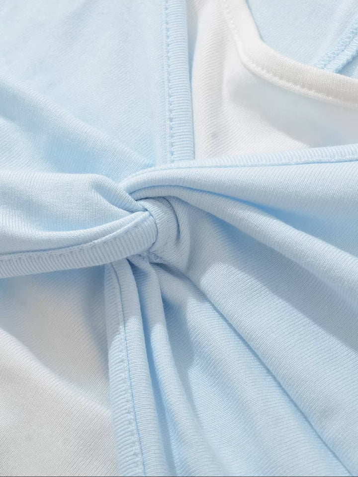 レイヤードツイストデザイントップス