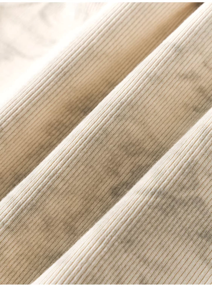 マーブルデザインハイネックスリーブレストップス