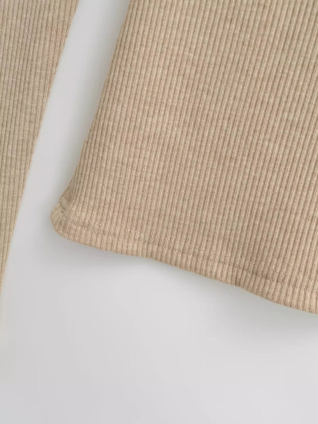 アシンメトリーネックリブトップス